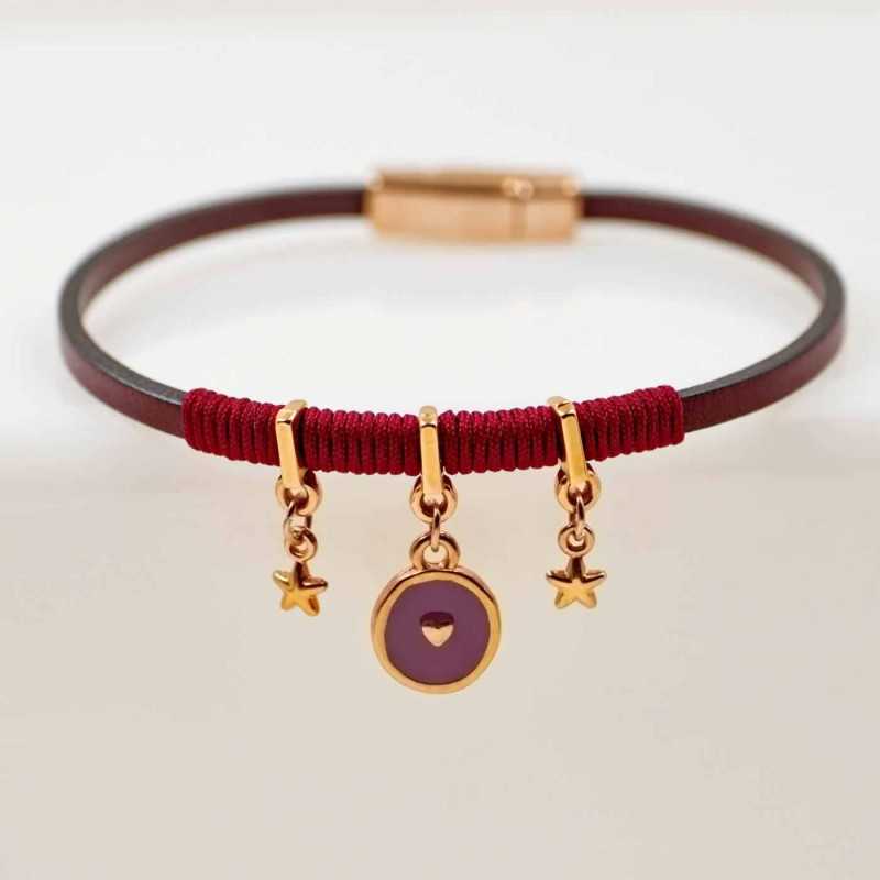 Handmade leather bracelet with rose gold-plated metal parts and enamel Handmade leather bracelet with rose gold-plated metal parts and enamel