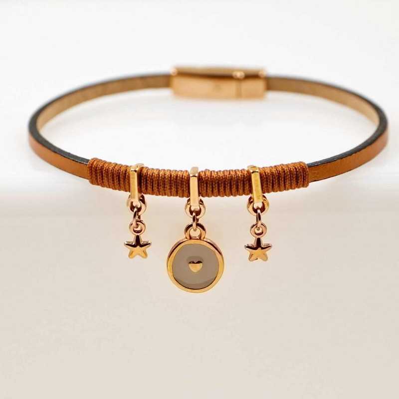 Handmade leather bracelet with rose gold-plated metal parts and enamel Handmade leather bracelet with rose gold-plated metal parts and enamel