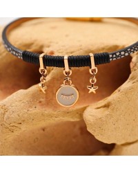 Handmade leather bracelet with rose gold-plated metal parts and enamel Handmade leather bracelet with rose gold-plated metal parts and enamel
