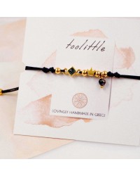 Makrame bracelet with gold-plated crown Handmade makrame bracelet made of high quality cord with gold-plated crown