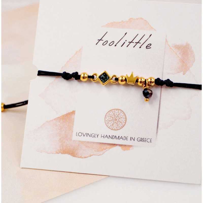 Makrame bracelet with gold-plated crown Handmade makrame bracelet made of high quality cord with gold-plated crown
