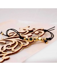 Makrame bracelet with gold-plated crown Handmade makrame bracelet made of high quality cord with gold-plated crown
