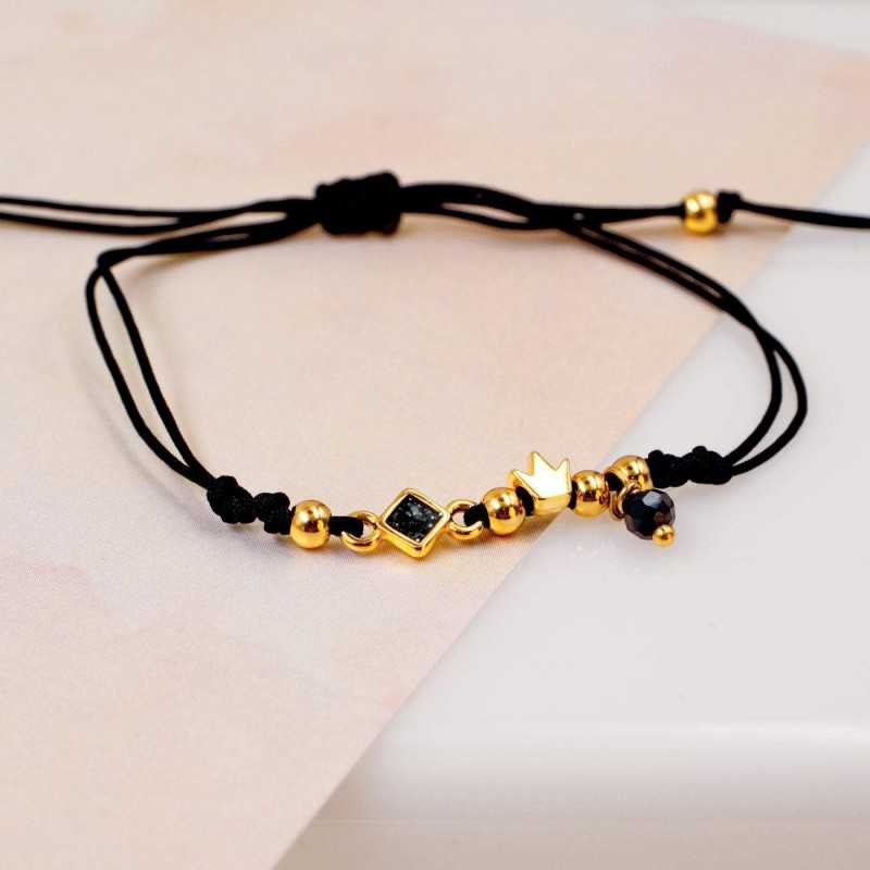 Makrame bracelet with gold-plated crown Handmade makrame bracelet made of high quality cord with gold-plated crown