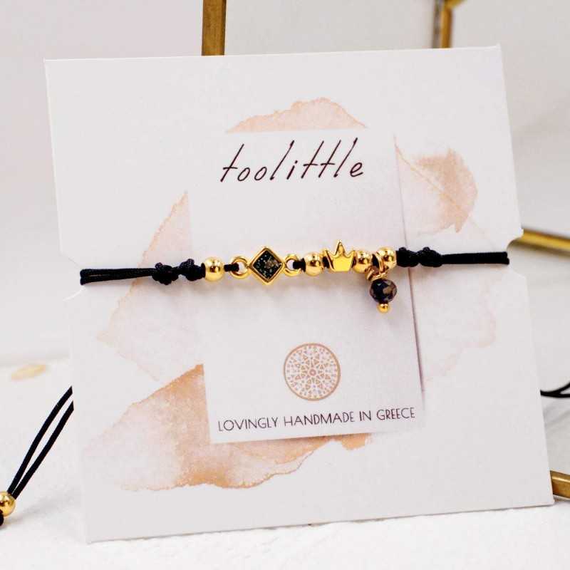 Makrame bracelet with gold-plated crown Handmade makrame bracelet made of high quality cord with gold-plated crown