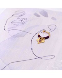 Handmade gold-plated hoop earrings with macrame embellishment and enamel Handmade gold-plated hoop earrings with macrame embellishment and enamel