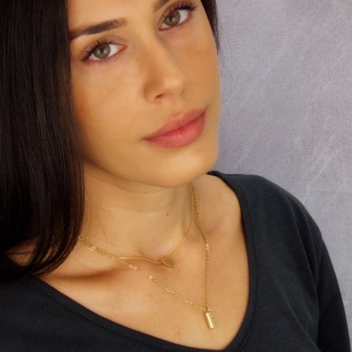 Short layered necklace with bullet bead and heart shaped part made of stainless steel