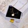 Short necklace with mother of pearl part in gold-plating Short necklace with mother of pearl part in gold-plating