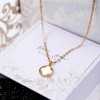 Short necklace with mother of pearl part in gold-plating Short necklace with mother of pearl part in gold-plating