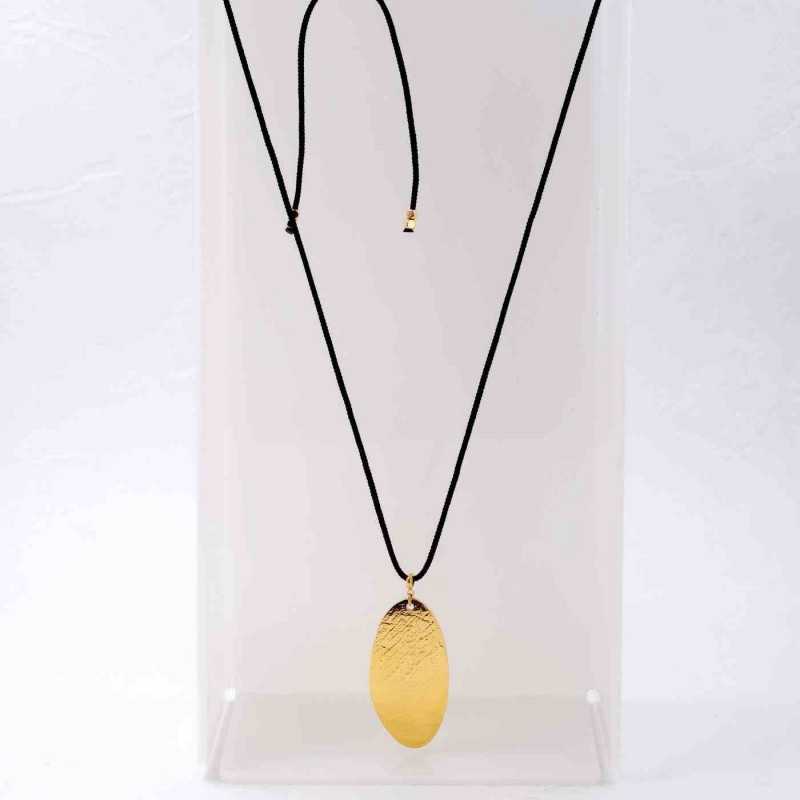 Long necklace with metallic pendant with organic shape