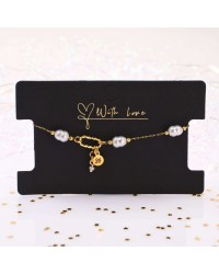 Stainless Steel Jewelry: Βραχιόλι - Γούρι με Καλλιεργημένα Μαργαριτάρια Βραχιόλι Γούρι 2026 από ανοξείδωτο ατσάλι με επιμετάλλωση 24Κ χρυσού