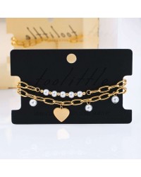 Stainless Steel Jewelry: Βραχιόλι Γούρι Καρδιά & Πέρλες Διπλό επίχρυσο βραχιόλι από ανοξείδωτο ατσάλι με καρδιά και πέρλες