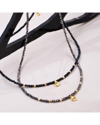 Χειροποίητο Κολιέ με Κρύσταλλα & Καρδιά Xειροποίητo κοντό κολιέ με κρύσταλλα και καρδούλα σε επίχρυση επιμετάλλωση