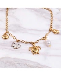 Stainless Steel Jewelry: Καλοκαιρινό Βραχιόλι με Χελώνα & Καλλιεργημένο Μαργαριτάρι Επίχρυσο βραχιόλι από ανοξείδωτο ατσάλι με θαλασσινά στοιχεία και καλλιεργημένο μαργαριτάρι