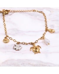 Stainless Steel Jewelry: Καλοκαιρινό Βραχιόλι με Χελώνα & Καλλιεργημένο Μαργαριτάρι Επίχρυσο βραχιόλι από ανοξείδωτο ατσάλι με θαλασσινά στοιχεία και καλλιεργημένο μαργαριτάρι