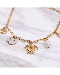 Stainless Steel Jewelry: Καλοκαιρινό Βραχιόλι με Χελώνα & Καλλιεργημένο Μαργαριτάρι Επίχρυσο βραχιόλι από ανοξείδωτο ατσάλι με θαλασσινά στοιχεία και καλλιεργημένο μαργαριτάρι