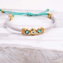 Χειροποίητο Δερμάτινο Βραχιόλι με Επίχρυσο Μάτι και Κρύσταλλα Χειροποίητο δερμάτινο βραχιόλι με επίχρυσο μάτι από σμάλτο και κρύσταλλα